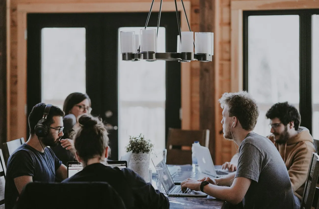 Team discussing a project around a table